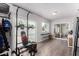 Bright workout area with exercise equipment, light flooring and natural light at 3832 W Eva St, Phoenix, AZ 85051