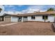 Lovely single-level home featuring a desert rock front yard and neutral exterior paint at 3832 W Eva St, Phoenix, AZ 85051
