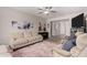 Living room with comfortable sofas and a view of the entryway at 3832 W Eva St, Phoenix, AZ 85051
