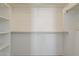 Spacious walk-in closet with adjustable shelving, providing ample storage space at 3894 E Palmer St, Gilbert, AZ 85298