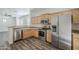 Updated kitchen featuring stainless steel appliances, wood cabinets, and granite countertops at 3894 E Palmer St, Gilbert, AZ 85298