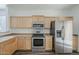 Modern kitchen featuring stainless steel appliances and ample counter space at 3894 E Palmer St, Gilbert, AZ 85298