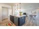 Open kitchen with island and eat in dining area at 406 W Flower St, Phoenix, AZ 85013