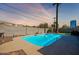 Inviting backyard pool surrounded by a concrete patio at 406 W Flower St, Phoenix, AZ 85013