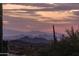 Scenic landscape showcasing a city view, mountainous horizons and desert vegetation at 41353 N 106Th St, Scottsdale, AZ 85262