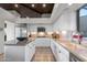 Bright kitchen featuring stainless steel appliances, granite counters, and ample cabinet space at 41353 N 106Th St, Scottsdale, AZ 85262
