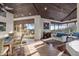 Bright living room with tile floors, an open floorplan, large windows, and an adjacent dining area at 41353 N 106Th St, Scottsdale, AZ 85262