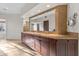 Bathroom with double vanity, granite countertops, and tiled backsplash at 41353 N 106Th St, Scottsdale, AZ 85262