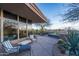 Outdoor patio with desert landscaping, outdoor seating, and a water feature at 41353 N 106Th St, Scottsdale, AZ 85262