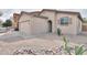 Single-Gathering home with a two-car garage and low-maintenance desert landscaping at 44125 W Cydnee Dr, Maricopa, AZ 85138