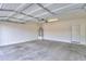 Spacious two car garage featuring ample room for storage at 44125 W Cydnee Dr, Maricopa, AZ 85138