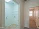 Laundry room with tile flooring and shelving at 44125 W Cydnee Dr, Maricopa, AZ 85138