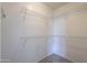 Bright walk-in closet with wire shelving on all sides at 44125 W Cydnee Dr, Maricopa, AZ 85138