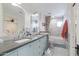 This hall bathroom features a long vanity with double sinks and a shower-tub combo at 4639 E Mulberry Dr, Phoenix, AZ 85018