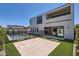 Modern home exterior showcases a pool, patio, balcony, and clean architectural lines, designed for outdoor living at 4640 E Glenrosa Ave, Phoenix, AZ 85018