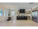 Bright, open kitchen with stainless steel refrigerator and dining area provides ample space at 4640 E Glenrosa Ave, Phoenix, AZ 85018