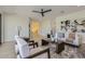 Bright living room featuring hardwood floors, contemporary decor, and an open layout perfect for entertaining at 4640 E Glenrosa Ave, Phoenix, AZ 85018