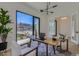 Well-lit office space with large windows, hardwood floors, and a modern light fixture at 4640 E Glenrosa Ave, Phoenix, AZ 85018