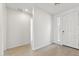 Clean entryway with light wood-look tile flooring and neutral walls at 5046 W Karl St, San Tan Valley, AZ 85144