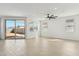 Open living space with sliding glass doors, recessed lighting, and tiled floors at 5046 W Karl St, San Tan Valley, AZ 85144
