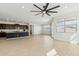 Spacious living area with an open layout and bright, neutral paint at 5046 W Karl St, San Tan Valley, AZ 85144