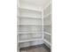 Pantry with many shelves for organized storage at 5046 W Karl St, San Tan Valley, AZ 85144