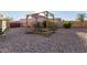 Backyard gardening space featuring a raised garden bed surrounded by gravel at 5215 S Monte Vista St, Chandler, AZ 85249