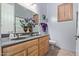 Bathroom with dual sinks, a modern vanity, and decorative flower arrangement at 5215 S Monte Vista St, Chandler, AZ 85249