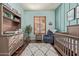 Comfortable Bedroom with a changing table, recliner, and a modern rug at 5215 S Monte Vista St, Chandler, AZ 85249