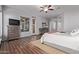 Spacious main bedroom has hardwood floors, a ceiling fan and exterior door to a private patio at 5215 S Monte Vista St, Chandler, AZ 85249