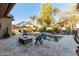Relaxing backyard featuring a pool, fire pit, and desert landscaping for outdoor enjoyment at 5215 S Monte Vista St, Chandler, AZ 85249