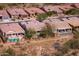 Aerial view of a neighborhood featuring well-maintained homes, desert landscaping, and private pools at 5723 E Jake Hvn, Cave Creek, AZ 85331