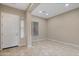 Bright entryway featuring tile flooring, recessed lighting, and a view of the interior space at 5723 E Jake Hvn, Cave Creek, AZ 85331
