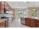 Modern kitchen featuring stainless steel appliances, granite counters, and ample cabinet space at 5723 E Jake Hvn, Cave Creek, AZ 85331