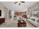 Inviting open-concept living space featuring a modern kitchen and comfortable seating arrangement at 5723 E Jake Hvn, Cave Creek, AZ 85331