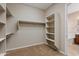 Walk-in closet with shelving and carpeted floors at 5723 E Jake Hvn, Cave Creek, AZ 85331