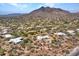 Expansive desert home with stunning mountain views and a large private lot outlined in red at 5805 E Agave Pl, Carefree, AZ 85377