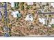 Overhead view of desert home with pool on a large private lot outlined in red at 5805 E Agave Pl, Carefree, AZ 85377