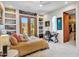 Bright bedroom features built-in shelves, desk, and access to a private patio at 5805 E Agave Pl, Carefree, AZ 85377