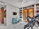 Bedroom features a ceiling fan, glass desk, and custom built-in shelving at 5805 E Agave Pl, Carefree, AZ 85377
