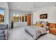 Well-lit bedroom features contemporary design, large windows, and a comfortable seating area at 5805 E Agave Pl, Carefree, AZ 85377