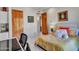 Inviting bedroom with warm tones, cozy bed, and direct access to a closet at 5805 E Agave Pl, Carefree, AZ 85377