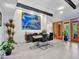 Open-concept dining room with modern table and chairs and colorful artwork displayed at 5805 E Agave Pl, Carefree, AZ 85377