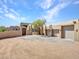 Lovely desert home with three-car garage and covered front door at 5805 E Agave Pl, Carefree, AZ 85377