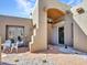 Exterior of front entrance with landscaped walkway and stucco architecture at 5805 E Agave Pl, Carefree, AZ 85377