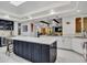 Spacious kitchen with large island, stainless steel appliances, and modern fixtures at 5805 E Agave Pl, Carefree, AZ 85377
