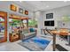 Living room features a neutral color palette, comfortable seating, and outdoor views at 5805 E Agave Pl, Carefree, AZ 85377