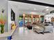 Open living room with outdoor views, modern furniture, and a sleek entertainment area at 5805 E Agave Pl, Carefree, AZ 85377