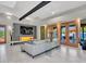 Spacious living room features a fireplace and access to the outdoor pool area at 5805 E Agave Pl, Carefree, AZ 85377