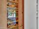 Pantry with glass front offers easy access to groceries and supplies at 5805 E Agave Pl, Carefree, AZ 85377